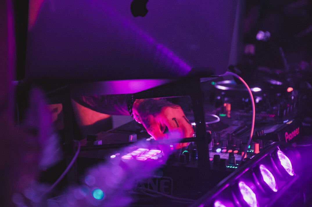 Technician adjusting a video switcher during a live broadcast